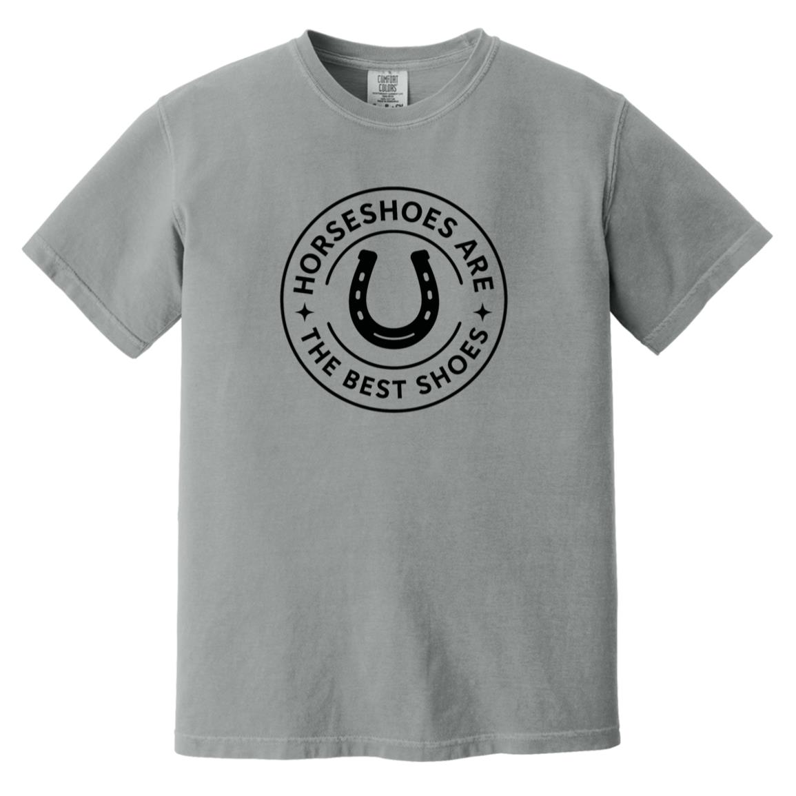 Horseshoe circle graphic reading “Horseshoes Are The Best Shoes” on short sleeve tee