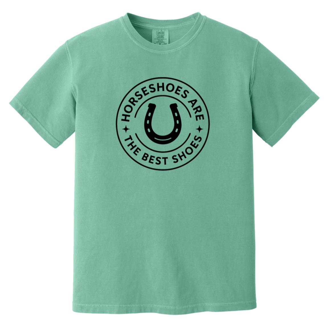 Horseshoe circle graphic reading “Horseshoes Are The Best Shoes” on short sleeve tee