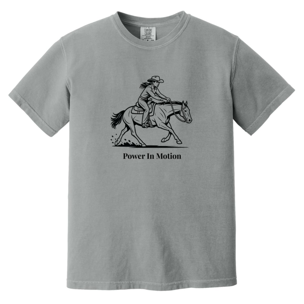 Female reining rider and horse graphic with text Power In Motion on short sleeve tee.