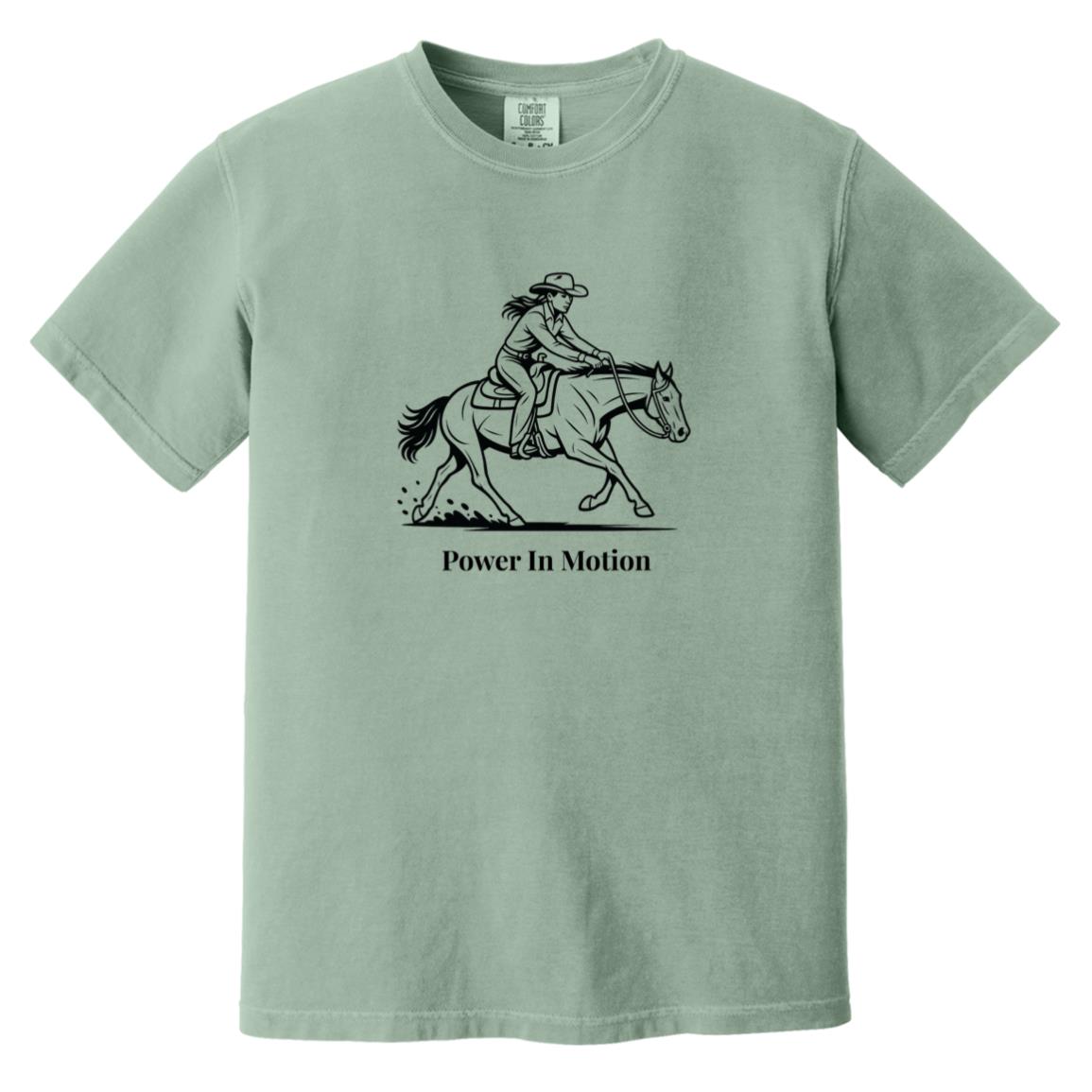 Female reining rider and horse graphic with text Power In Motion on short sleeve tee.